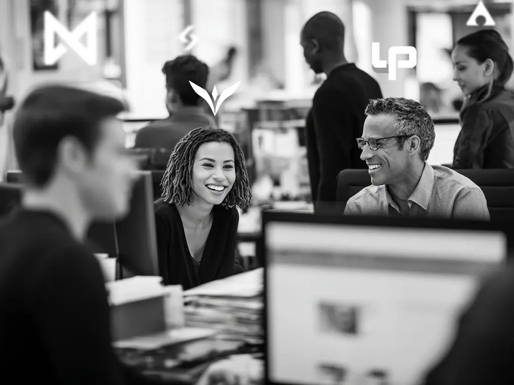 People in an office with different logos hovering over their heads.
