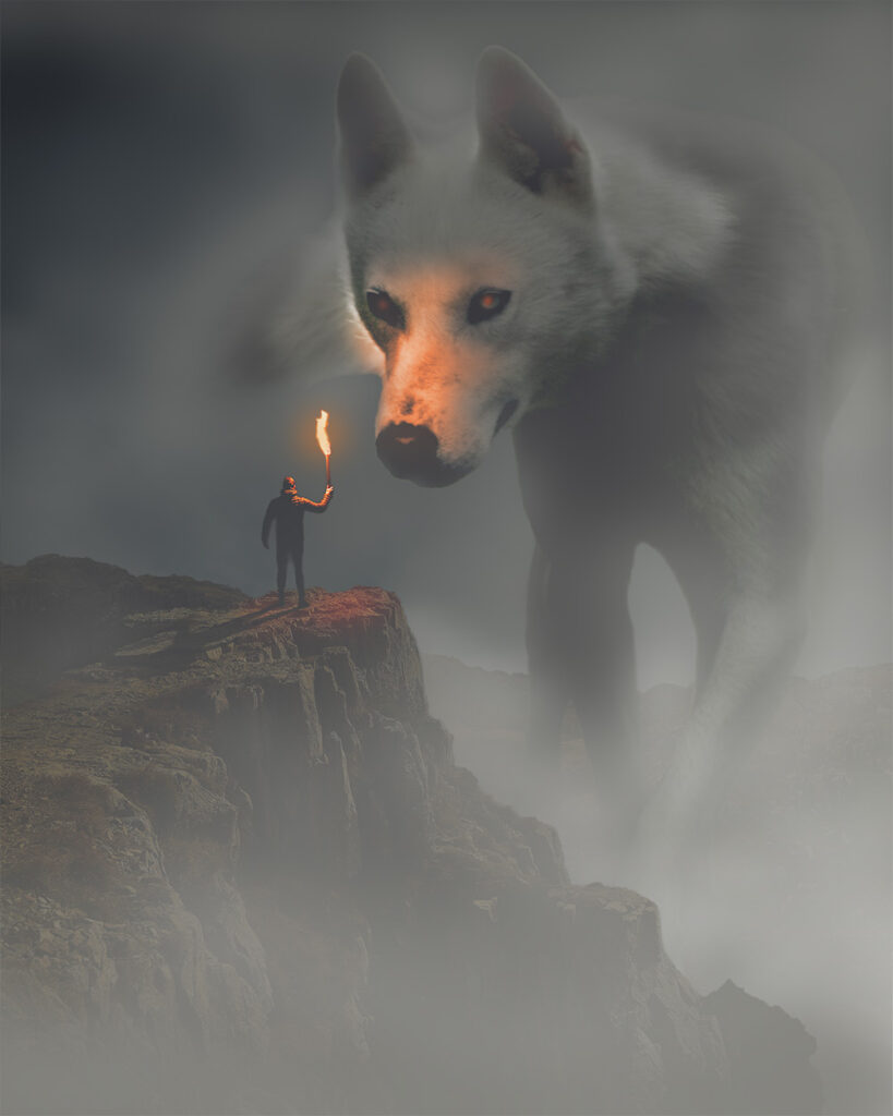 Spirit Dog Photoshop Manipulation A large dog with red glowing eyes appears through the fog looking at a man on a cliffside holding a brightly burning torch while heavy fog envelopes both of them.