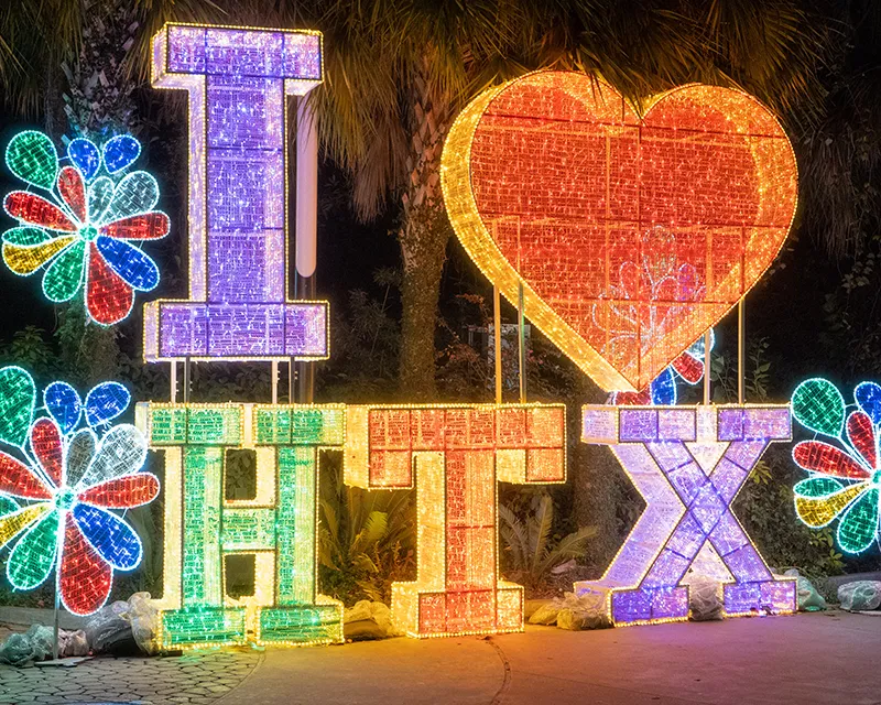 Colorful lights spelling 'I ❤️ HTX'